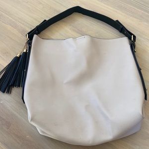 Shoulder bag with tassel detail. Mint condition.